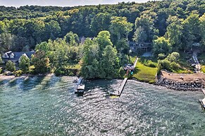 Torch Lake Home w/ 116 Feet of Blue Water Access!