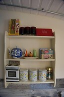 a Quirky Garden Building in an Orchard