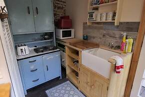 a Quirky Garden Building in an Orchard