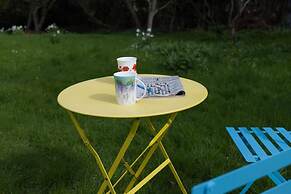 a Quirky Garden Building in an Orchard