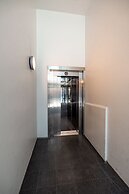 2ndhomes Stylish 1BR Apt w Sauna&Balcony