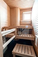 2ndhomes Stylish 1BR Apt w Sauna&Balcony