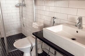 2ndhomes Stylish 1BR Apt w Sauna&Balcony