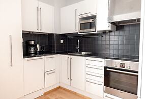 2ndhomes Stylish 1BR Apt w Sauna&Balcony