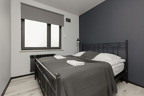 Industrial Bemowo Apartment by Renters