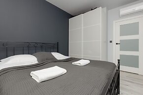 Industrial Bemowo Apartment by Renters