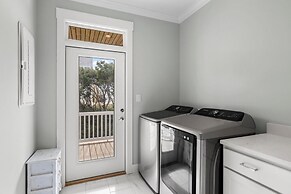 Once Upon A Tide 4 Bedroom Home by RedAwning