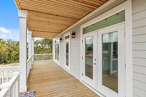 Once Upon A Tide 4 Bedroom Home by RedAwning