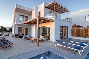 Blue Senses Villas Next to the Beach Heated Pool