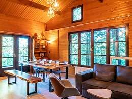 Chalet in the Woods With Jacuzzi and Sauna