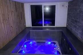 Chalet in the Woods With Jacuzzi and Sauna