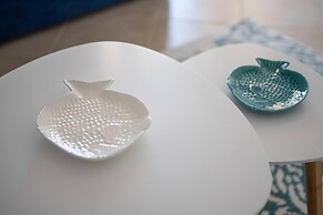 Welcomely - Xenia - Attico Mediterraneo