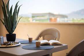 Welcomely - Xenia - Attico Mediterraneo