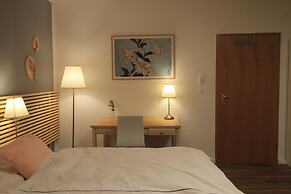 Asia Dreieck Pension Zimmer