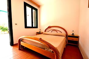 Comfortable Three-room Villa Located in Torre Dell'orso on the Ground 