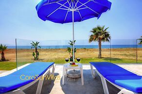 Blue - Beach Front Spectacular Villa Sleeps 10