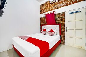 Super OYO 91173 Guesthouse King Puntodewo
