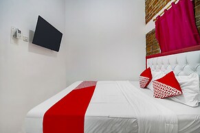 Super OYO 91173 Guesthouse King Puntodewo