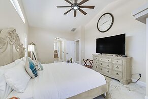 Luxe Waterfront Oasis w/ Dock, Heated Pool & Spa!