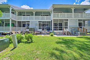 Old Florida Setting w/ Kayaks & Fishing Poles