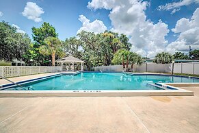Old Florida Setting w/ Kayaks & Fishing Poles