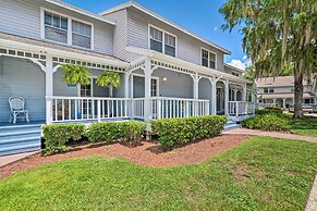 Old Florida Setting w/ Kayaks & Fishing Poles
