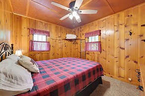 Cozy Carp Lake Cottage w/ Dock, Kayaks & Fire Pit