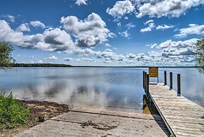 Cozy Carp Lake Cottage w/ Dock, Kayaks & Fire Pit