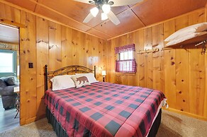 Cozy Carp Lake Cottage w/ Dock, Kayaks & Fire Pit