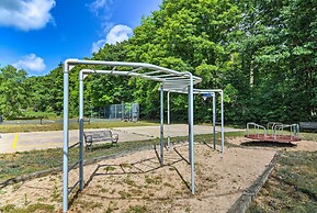 Cozy Carp Lake Cottage w/ Dock, Kayaks & Fire Pit