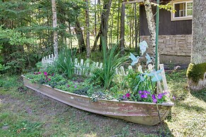 Lakefront Deer River Apt w/ Dock, Fire Pit & Patio