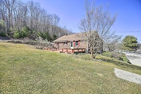 Quaint Creekside Home w/ Spacious Deck & Yard