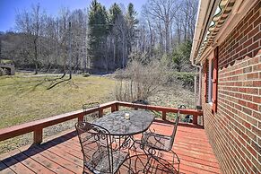 Quaint Creekside Home w/ Spacious Deck & Yard