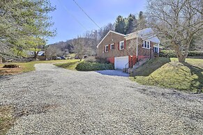 Quaint Creekside Home w/ Spacious Deck & Yard
