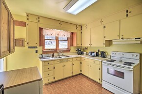 Quaint Creekside Home w/ Spacious Deck & Yard