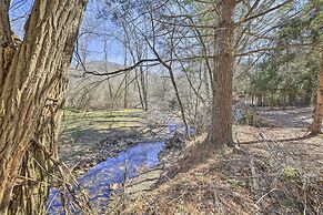 Quaint Creekside Home w/ Spacious Deck & Yard