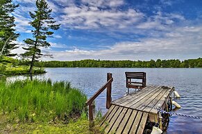 Burns Lake Cabin w/ Dock, Fire Pit, Rowboat & More