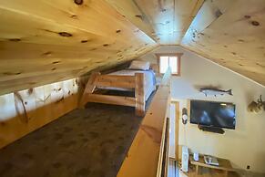 Burns Lake Cabin w/ Dock, Fire Pit, Rowboat & More