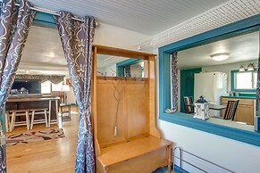 Colorful Cottage w/ Hot Tub - Steps to Long Lake!