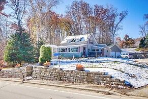 Colorful Cottage w/ Hot Tub - Steps to Long Lake!