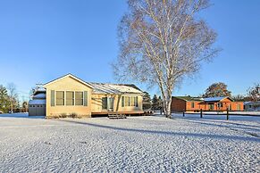 Cozy Riverfront Home w/ Fire Pit in Houghton Lake!