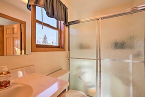 Cozy Riverfront Home w/ Fire Pit in Houghton Lake!