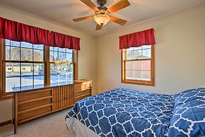 Cozy Riverfront Home w/ Fire Pit in Houghton Lake!