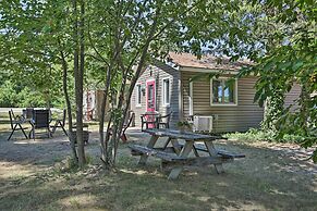 Cozy Suttons Bay Cottage w/ Shared Dock & Fire Pit