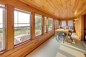 Waterfront Cottage w/ Sunroom + Patio & Grill