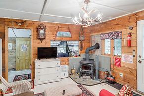 Rustic Waterfront Cottage w/ Fire Pit & Kayaks