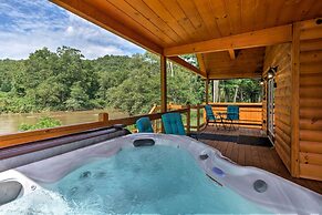 Deck & Hot Tub: Bryson City Riverfront Cabin!