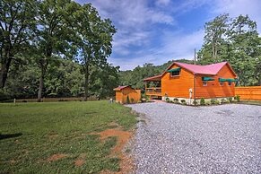 Deck & Hot Tub: Bryson City Riverfront Cabin!