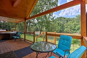 Deck & Hot Tub: Bryson City Riverfront Cabin!