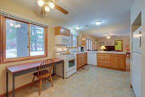 Cozy Cottage w/ Sunroom - Walk to Higgins Lake!